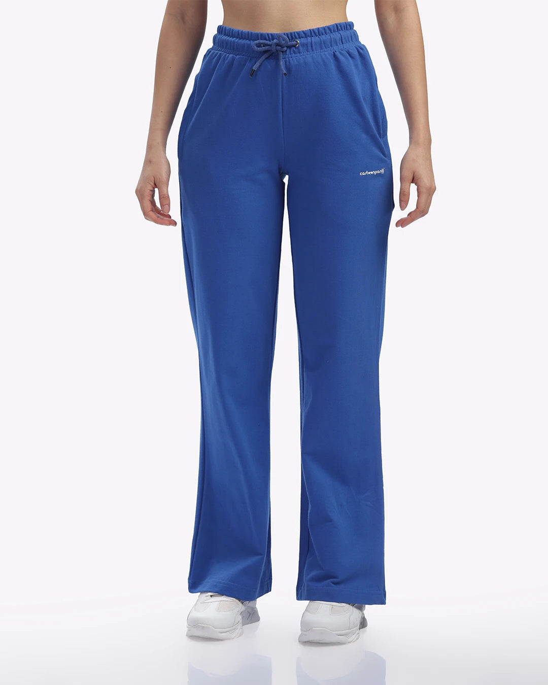 Blue pants worn by a person on a white background