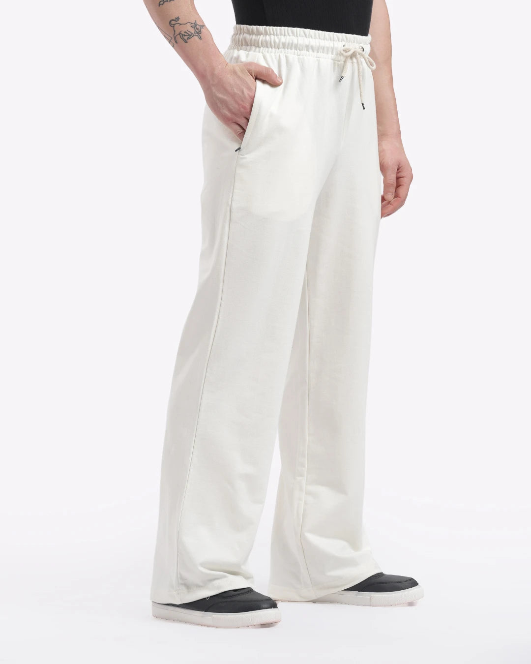 White wide-leg pants worn by a person on a white background