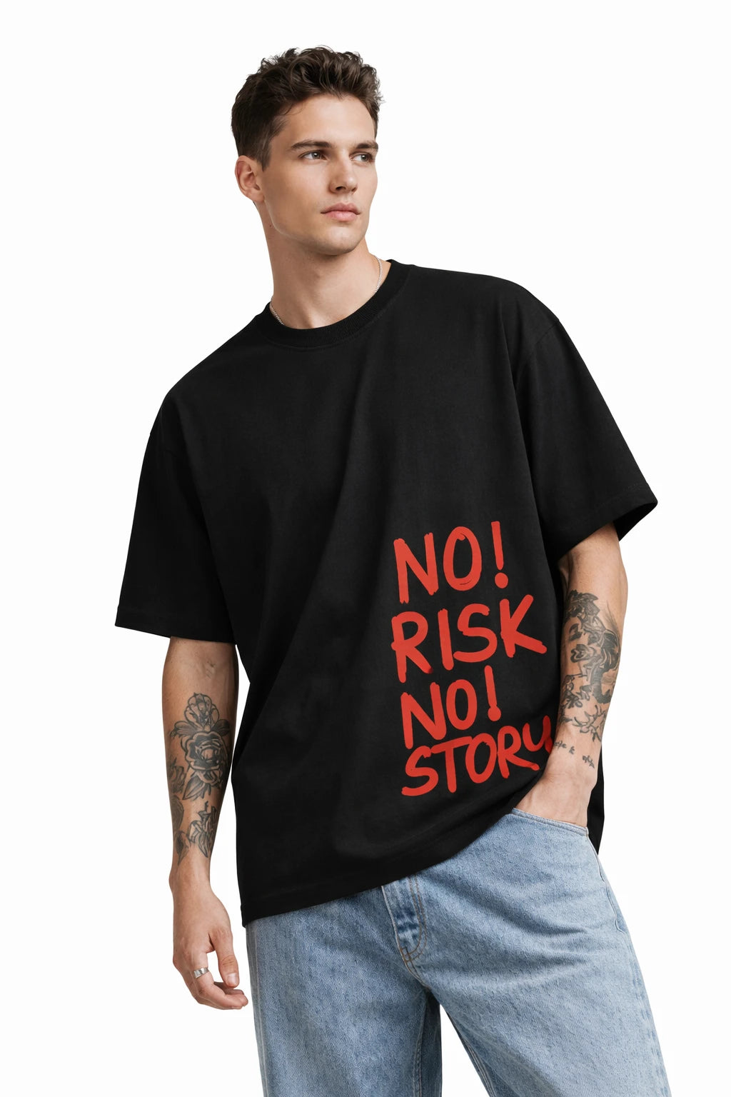 Man wearing a black t-shirt with red text 'NO! RISK NO STORY' on a white background