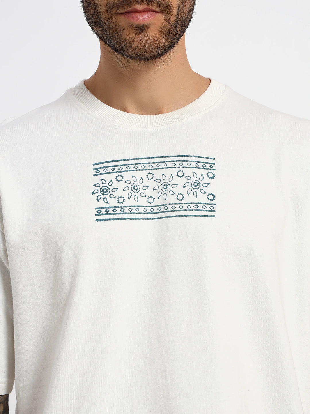White t-shirt with a green pattern on a white  by cartoonpanti  india