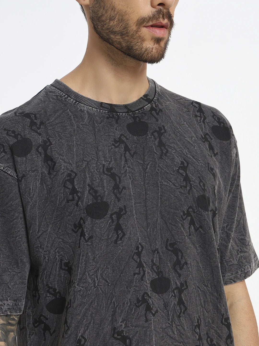 Man wearing a dark gray t-shirt with black graphic  by cartoonpanti by india