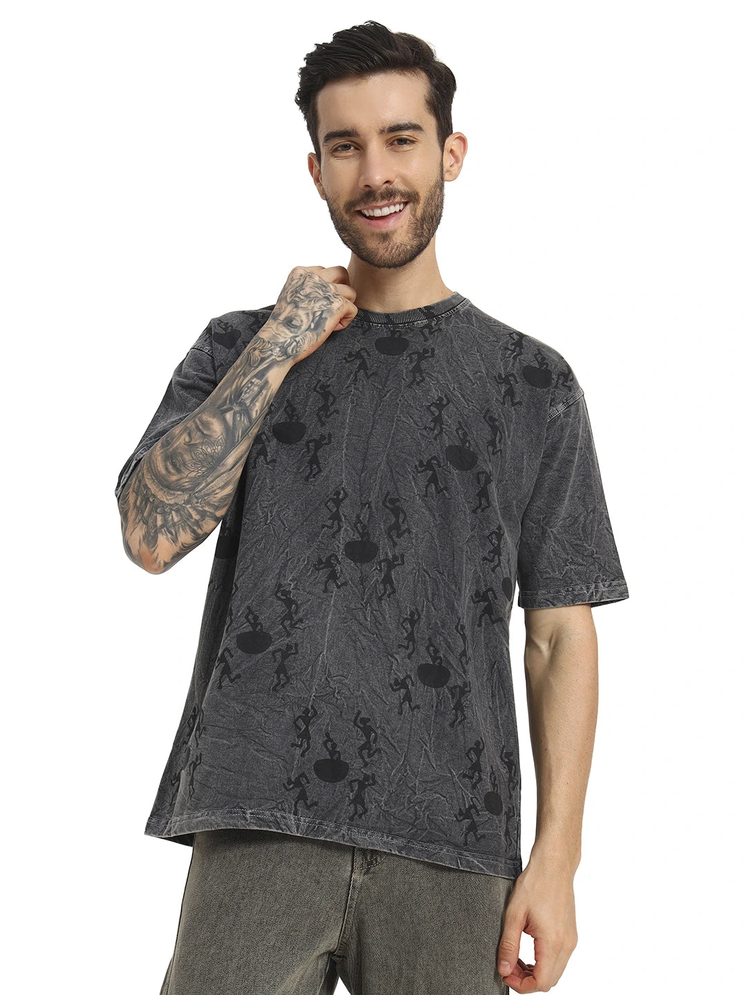 Man wearing a dark gray oversized t-shirt  by cartoonpanti india