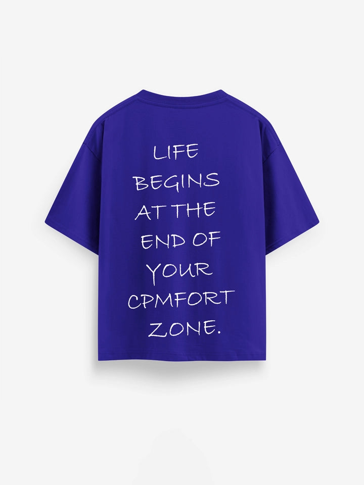 Blue oversized t-shirt with white text "life begins at the end of your comfort zone"  by cartoonpanti india
