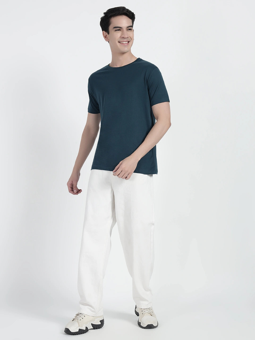 wearing a petrol blue plain T-shirt by cartoonpanti india