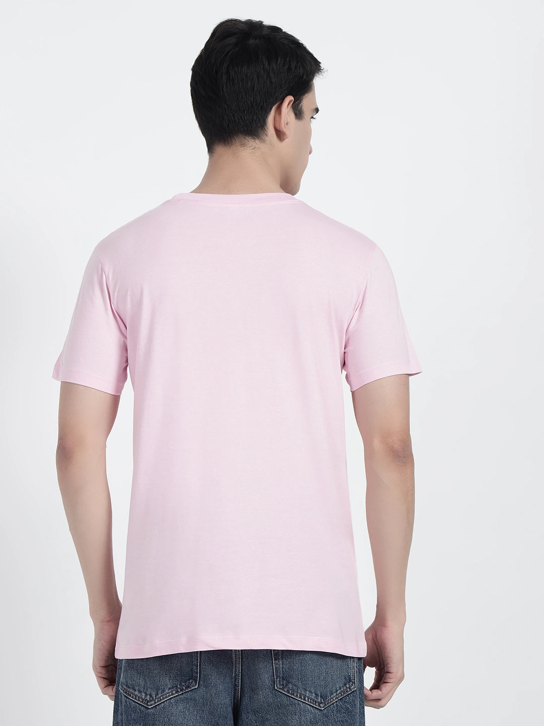 A person wearing a plain pink T-shirt by cartoonpanti india
