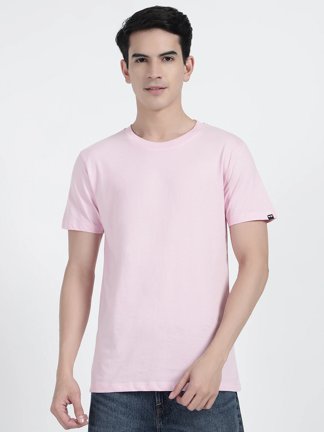 A person wearing a plain pink T-shirt by cartoonpanti india