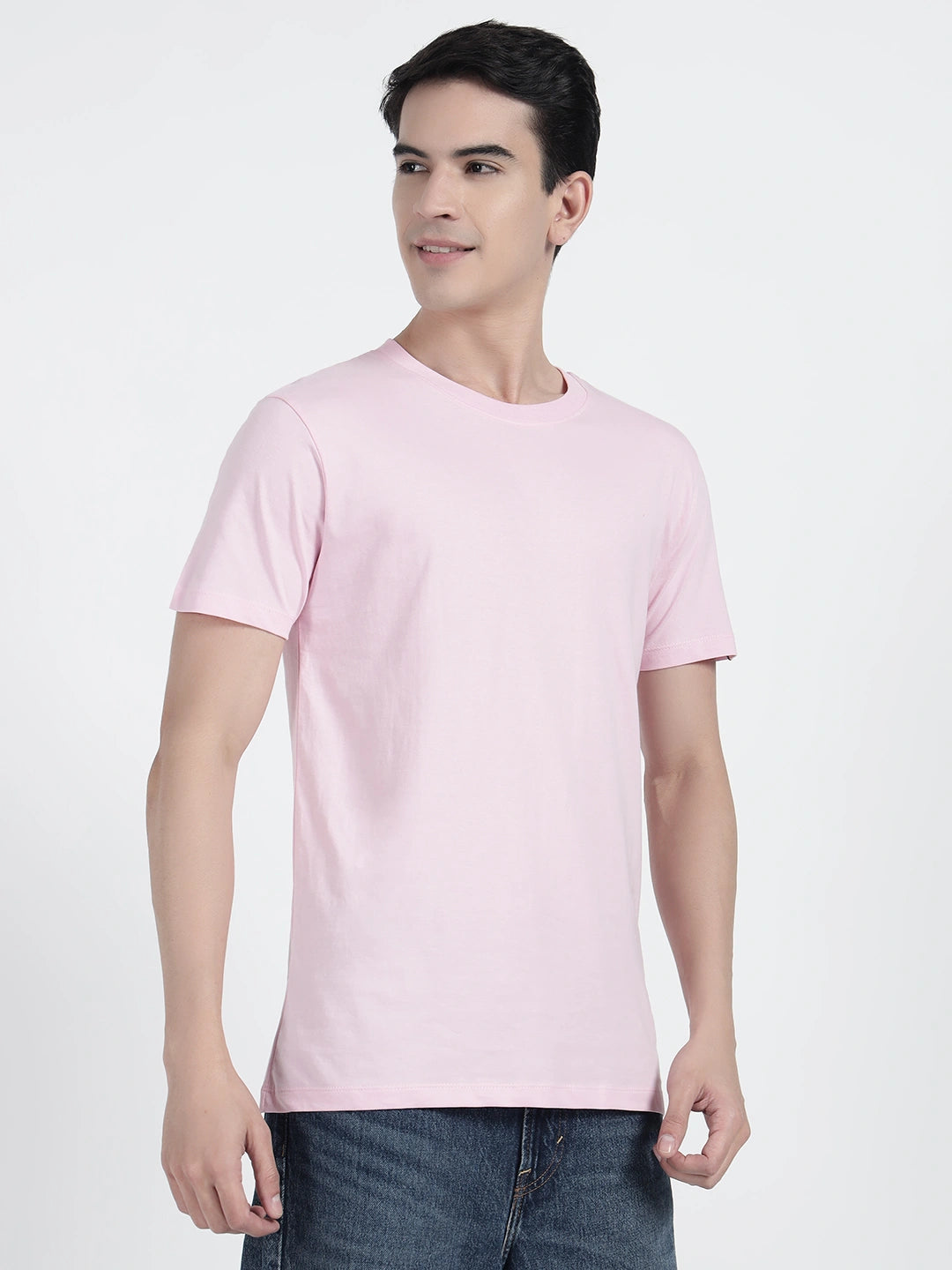 A person wearing a plain pink T-shirt by cartoonpanti india