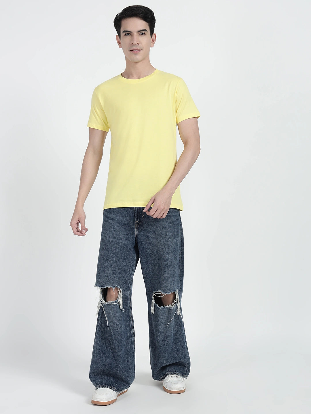 A man wearing a  sky yellow plain T-shirt by catrtoonpanti india