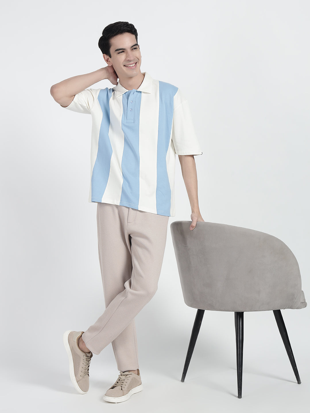  wearing a striped oversized polo shirt in white by cartoonpanti india