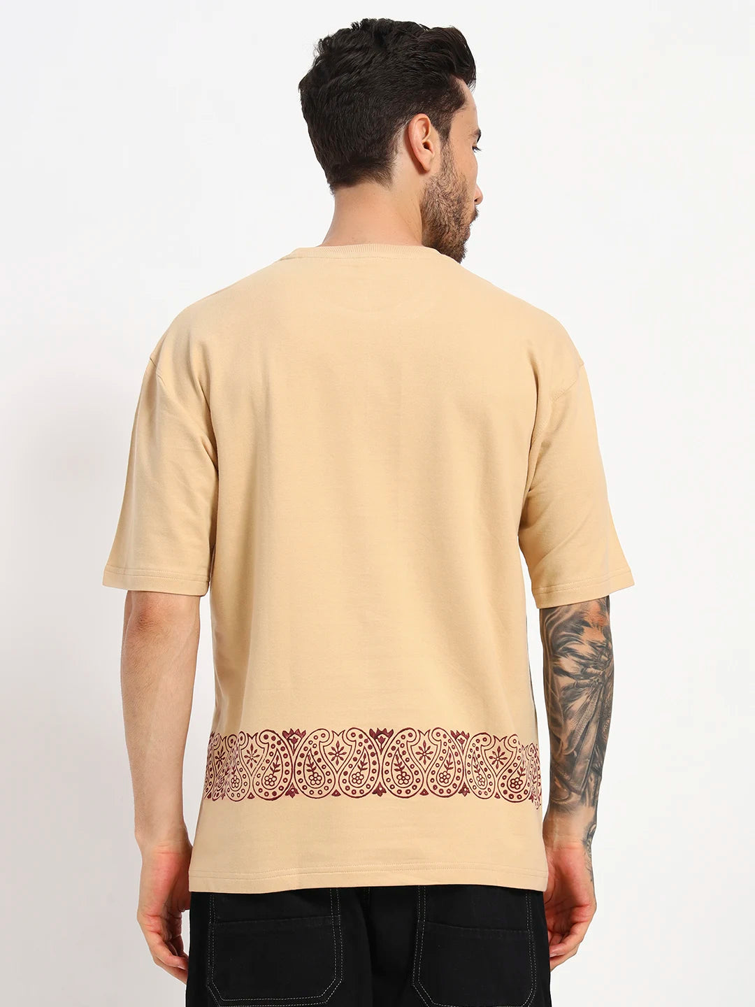 Man wearing a beige t-shirt with a decorative  by cartoonpanti by india