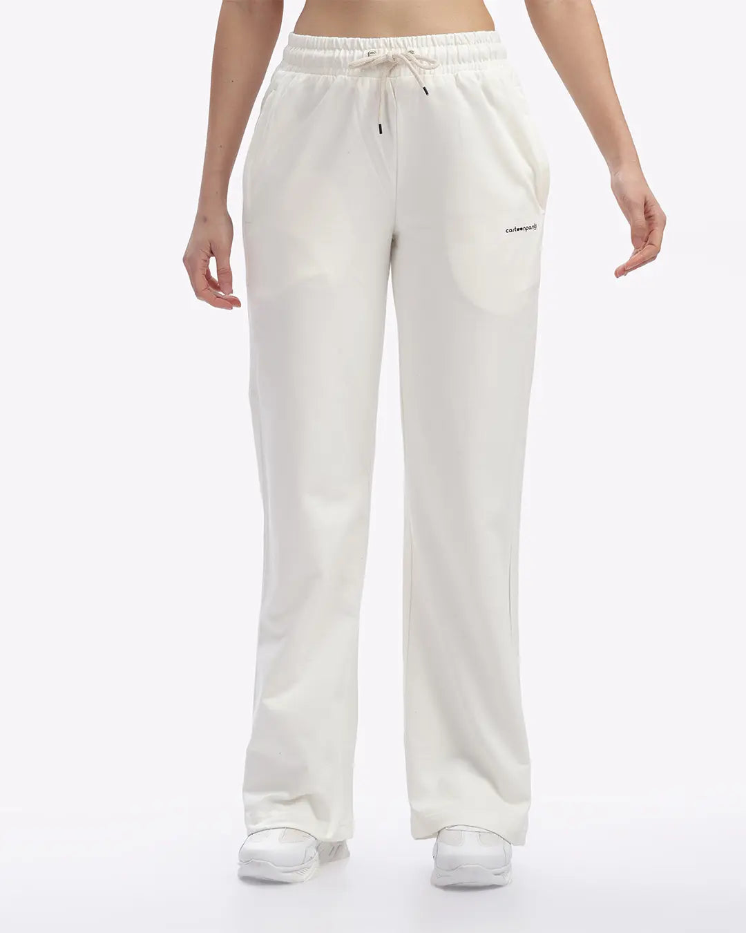 White pants worn by a person on a white background
