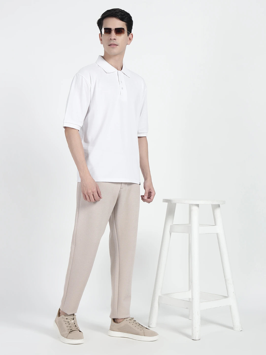  wearing a white oversized polo shirt by cartoonpanti india