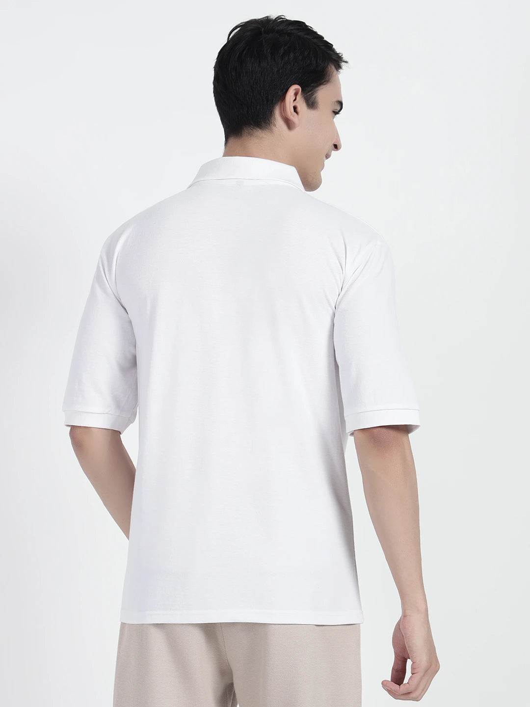  wearing a white oversized polo shirt by cartoonpanti india