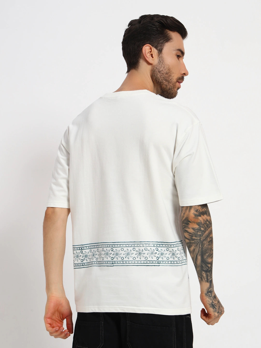 Man wearing a white t-shirt with a patterned hem  by cartoonpanti india