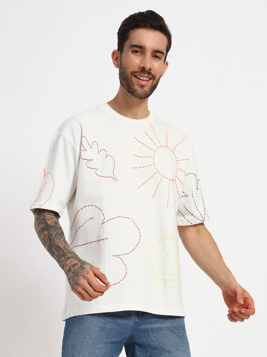 Man wearing a white t-shirt with abstract designs  by cartoonpanti india