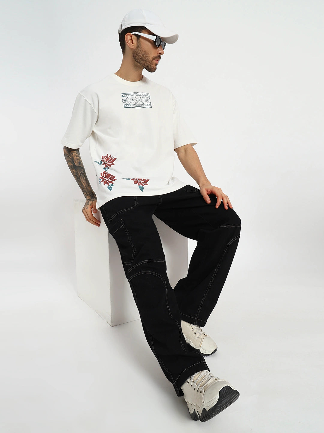Man wearing a white t-shirt with floral designs  by cartoonpanti  india