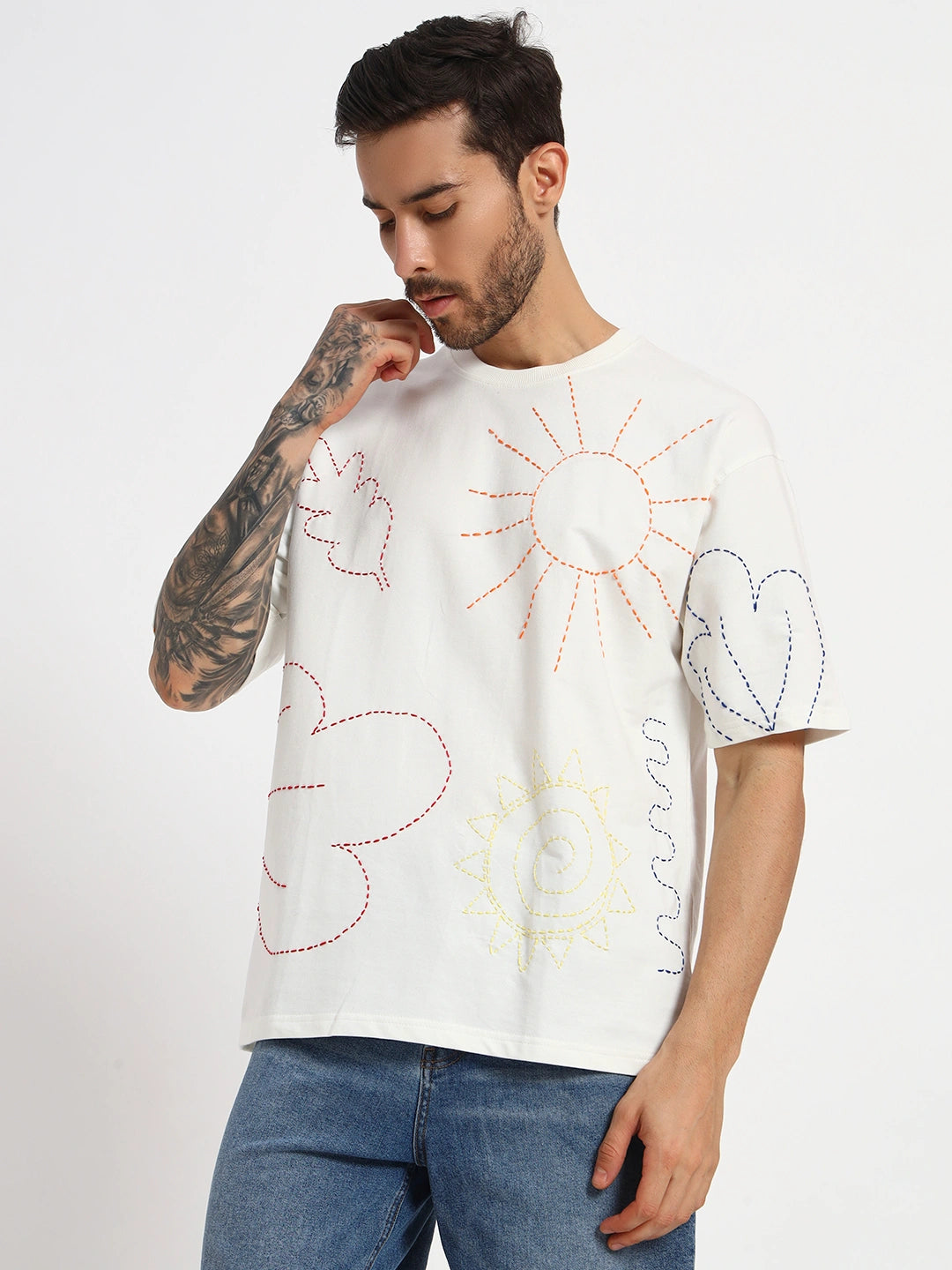 Man wearing a white t-shirt with colorful heart  by cartoonpanti  india